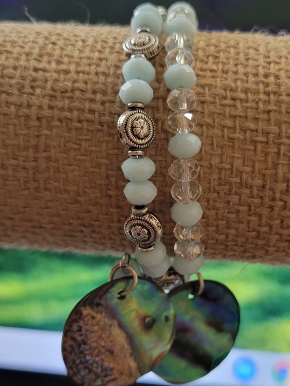 Eye Popping Pale Green Beads Adorned with Silver Dividers and Charms